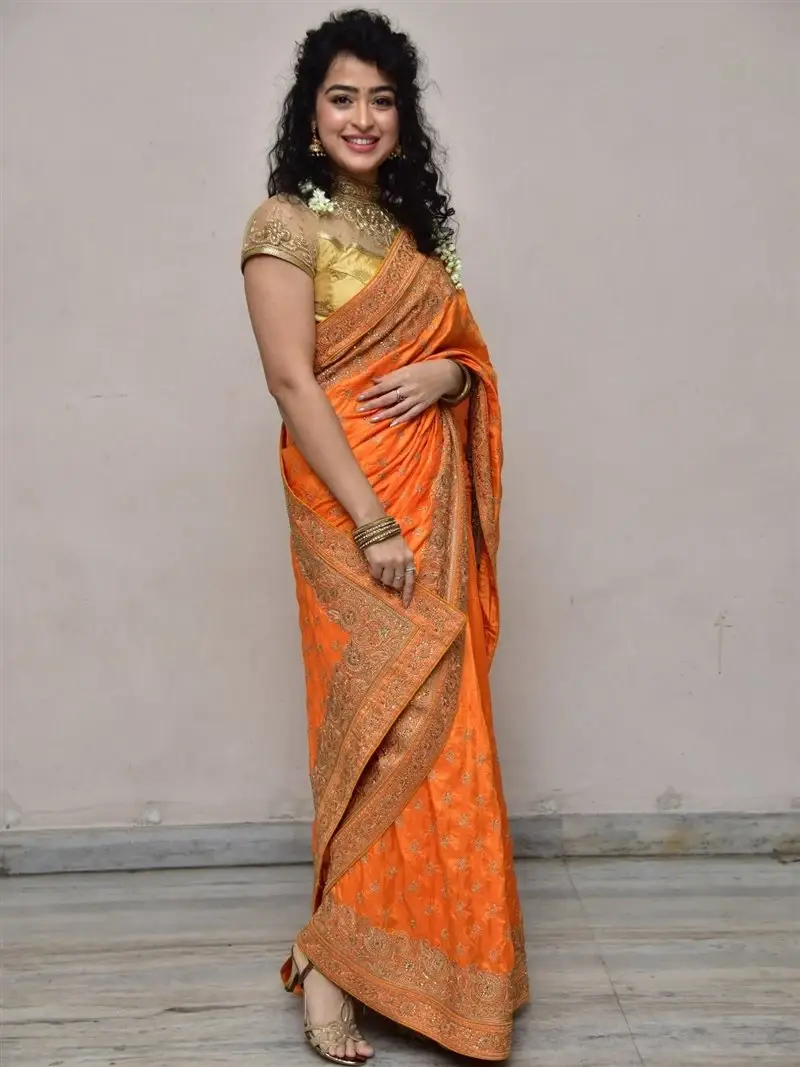 Actress Apsara Rani in Orange Saree at Talakona Movie Launch